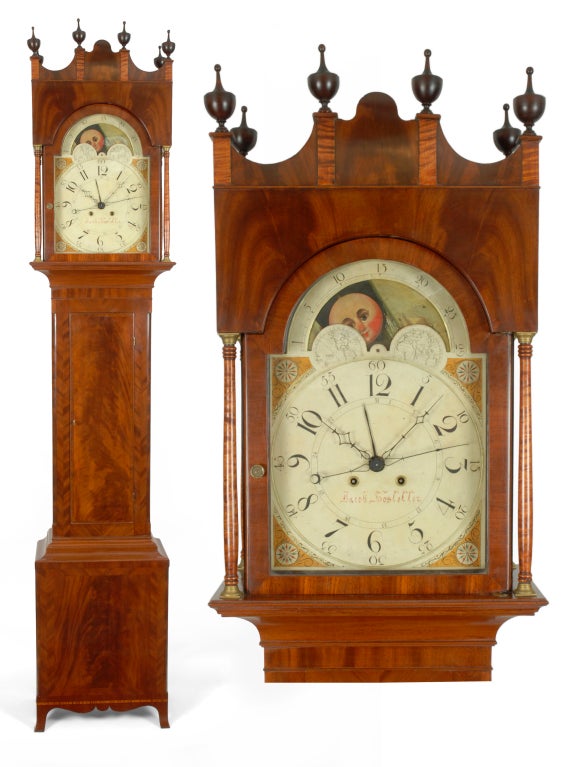 A rare and important “Castle Top” tall case clock, by Jacob Hostetter Senior, Hanover, Pennsylvania, circa 1815. The case from the Baltimore, Maryland area.
This impressive tall case clock has a rare crest treatment that is referred to as a “Castle