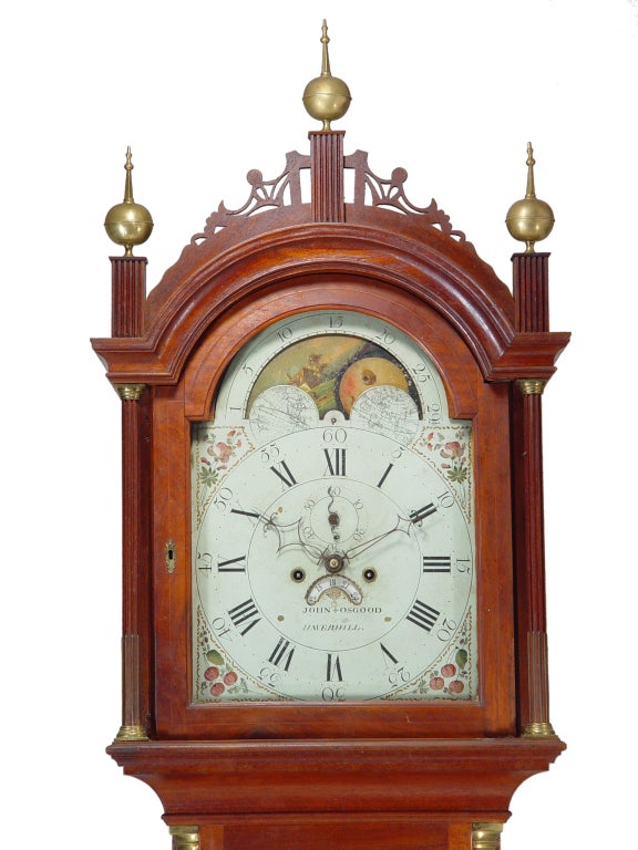 This Federal mahogany and inlaid tall case clock survives in fine original condition with a pleasing old surface.  The 