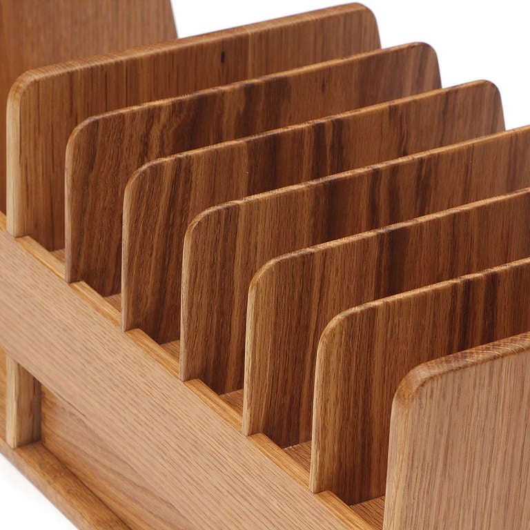 A bench-made solid wood desk organizer with dovetail joinery, comprising five correspondence dividers, a slim drawer and open storage.