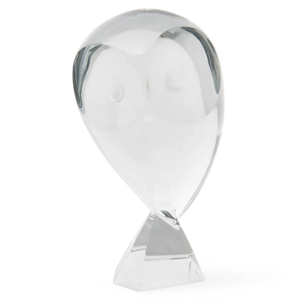 A whimsical and elegant unique signed sculpture of an abstracted perched owl finely rendered in clear crystal.