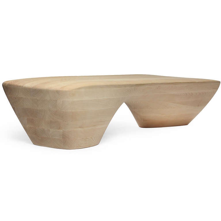 A magnificent and sculptural organically-shaped soaped-ash bench carved from a solid block of wood and designed by the architect Zaha Hadid. Designed for the Ordrupgaard Museum in Denmark, only ten examples were made.