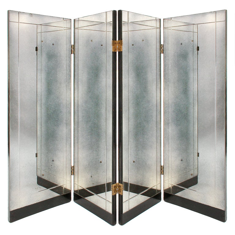 An etched mirror folding room divider with brass hinges and painted black base. Measurements are as shown. Each panel is 14