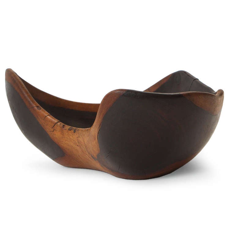 A signed rustic and expressive bowl carved from a block of solid crotch-cut Ironwood.
