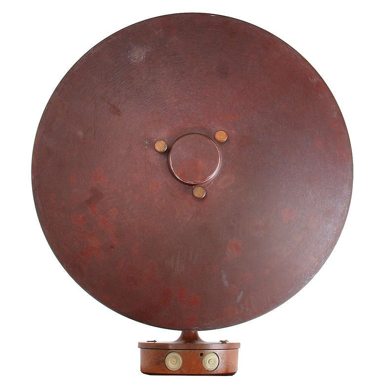 A nicely patinated sconce in copper designed for outdoor/indoor use.