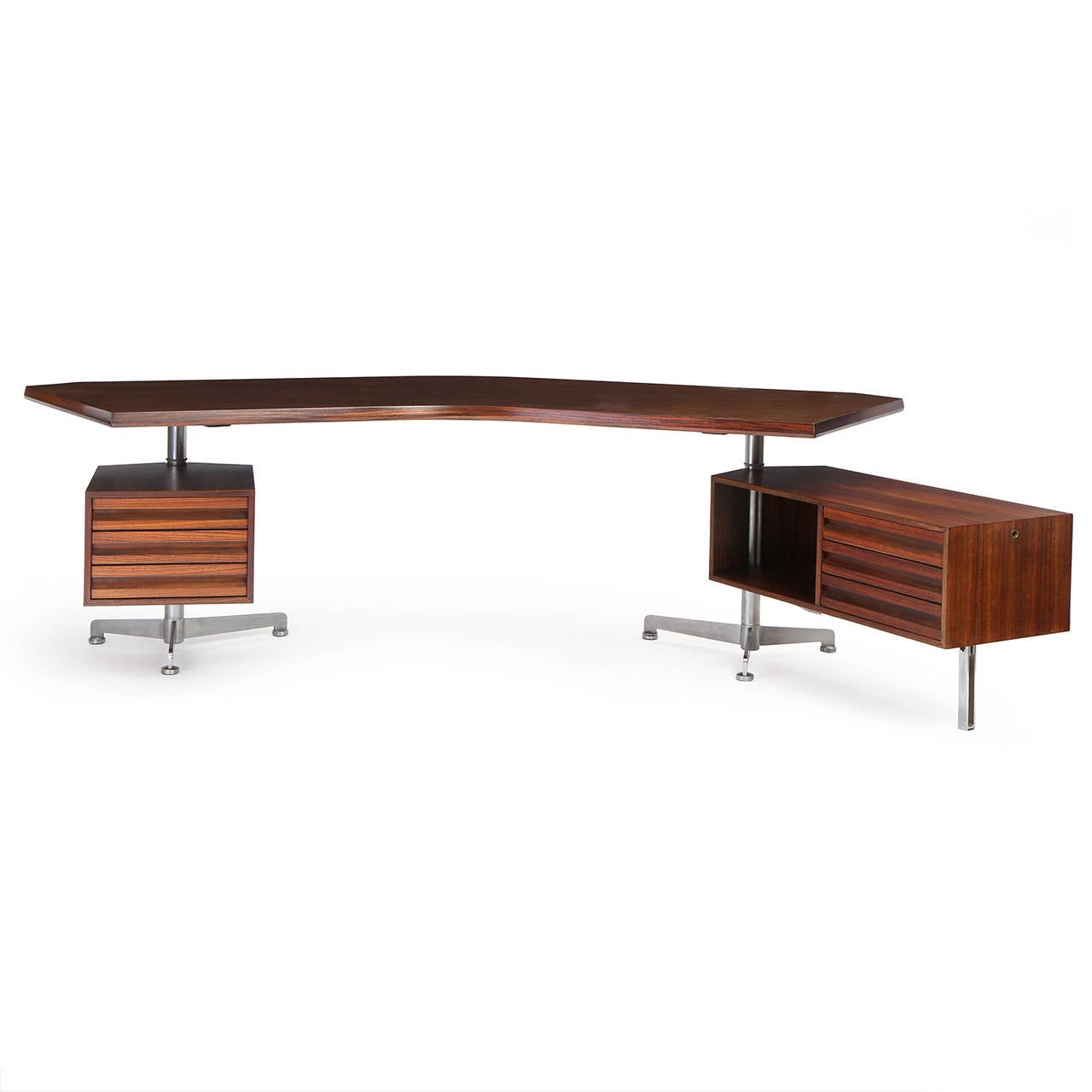 A dynamic and early version of a dramatic modernist desk in steel and walnut having a chevron shaped top with pivoting and floating attached cases with three drawers each.