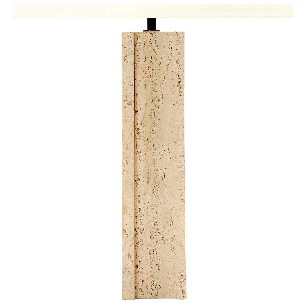 A square-columned table lamp made from overlapping travertine slabs.