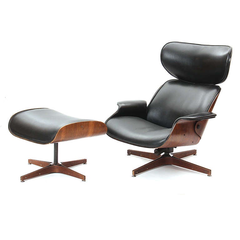 A swivelling lounge chair and ottoman for Plycraft having molded walnut shells and bases form fitted with seamless upholstery that is devoid of tufting.