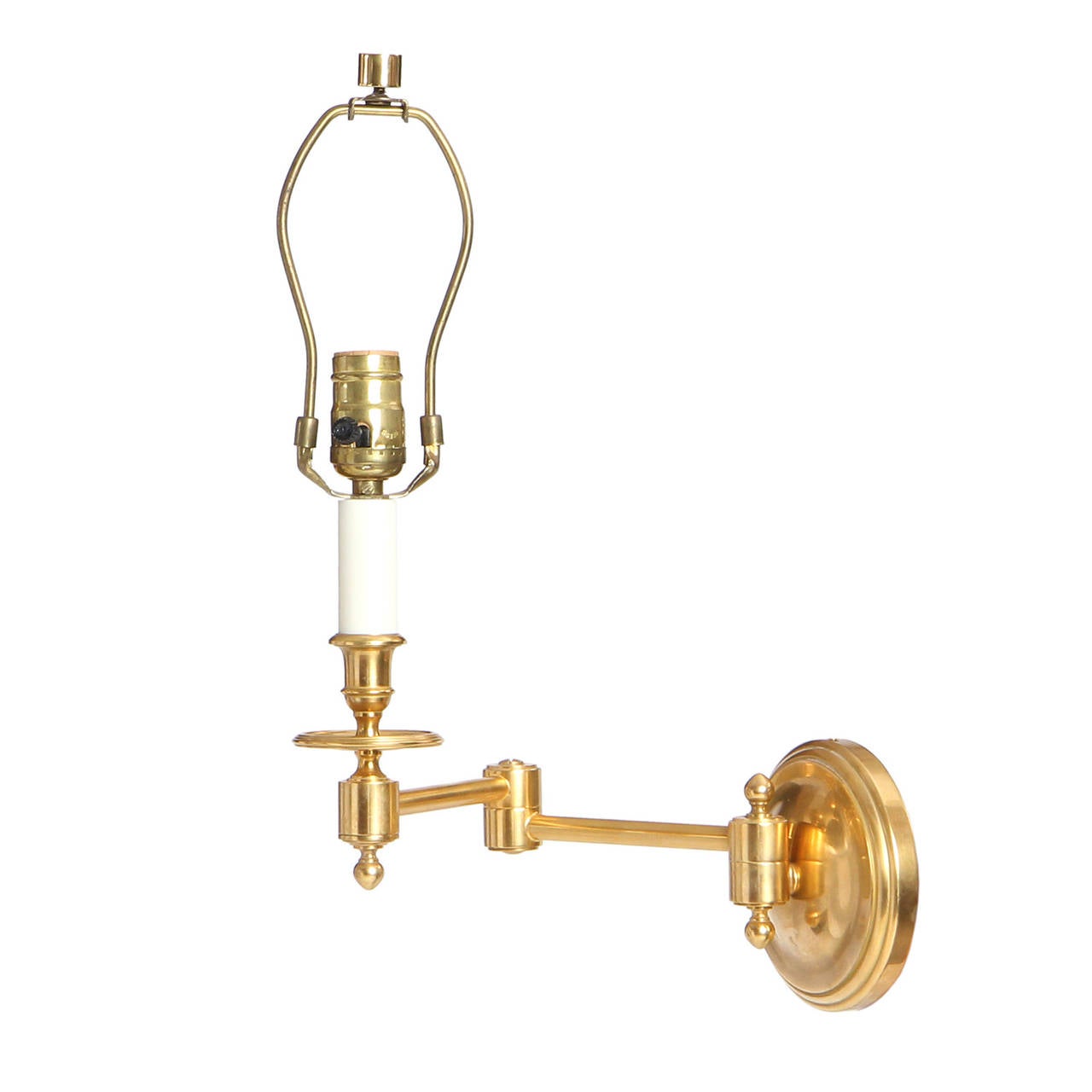 A Pair of Brass Swing Arm Wall Sconces 2