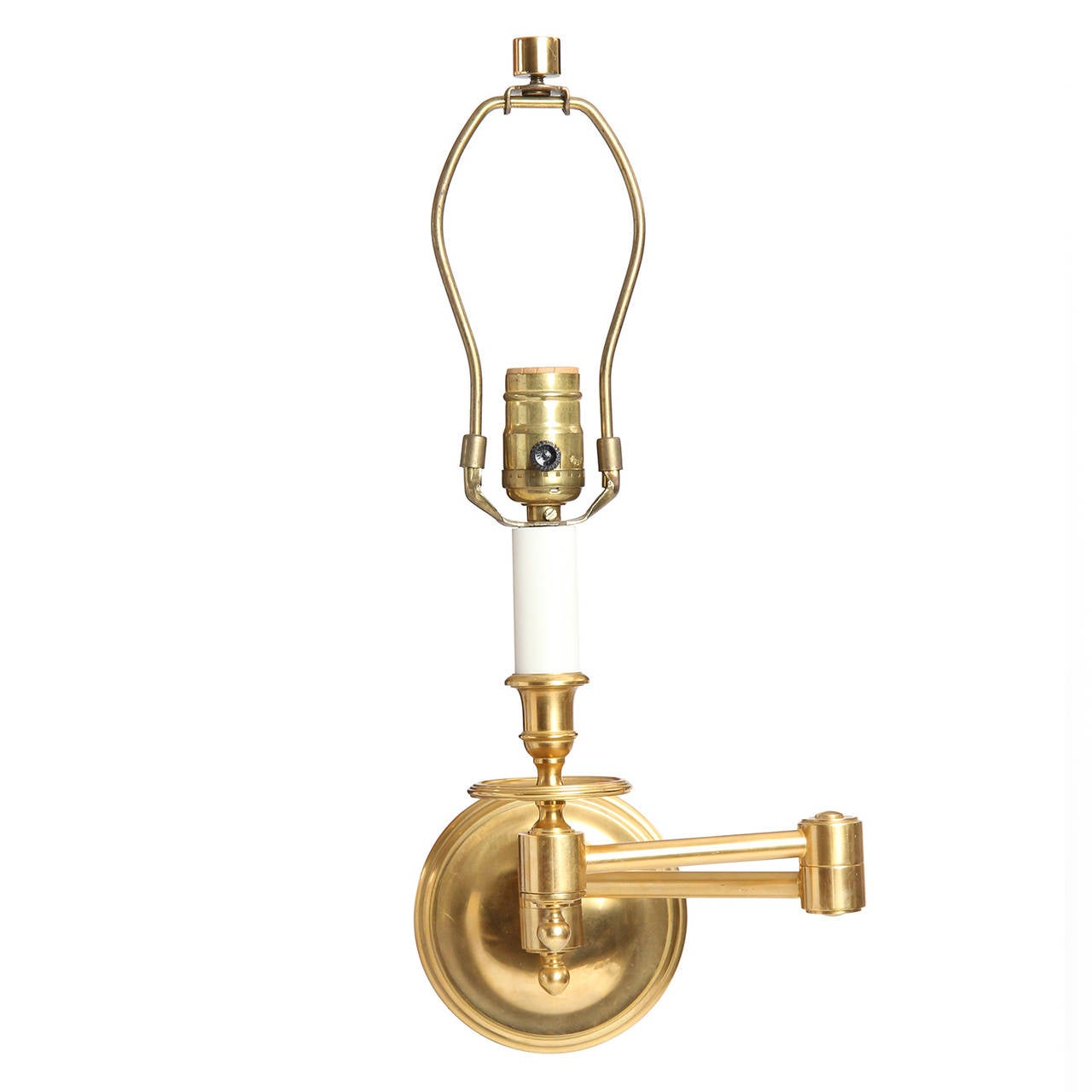 A Pair of Brass Swing Arm Wall Sconces