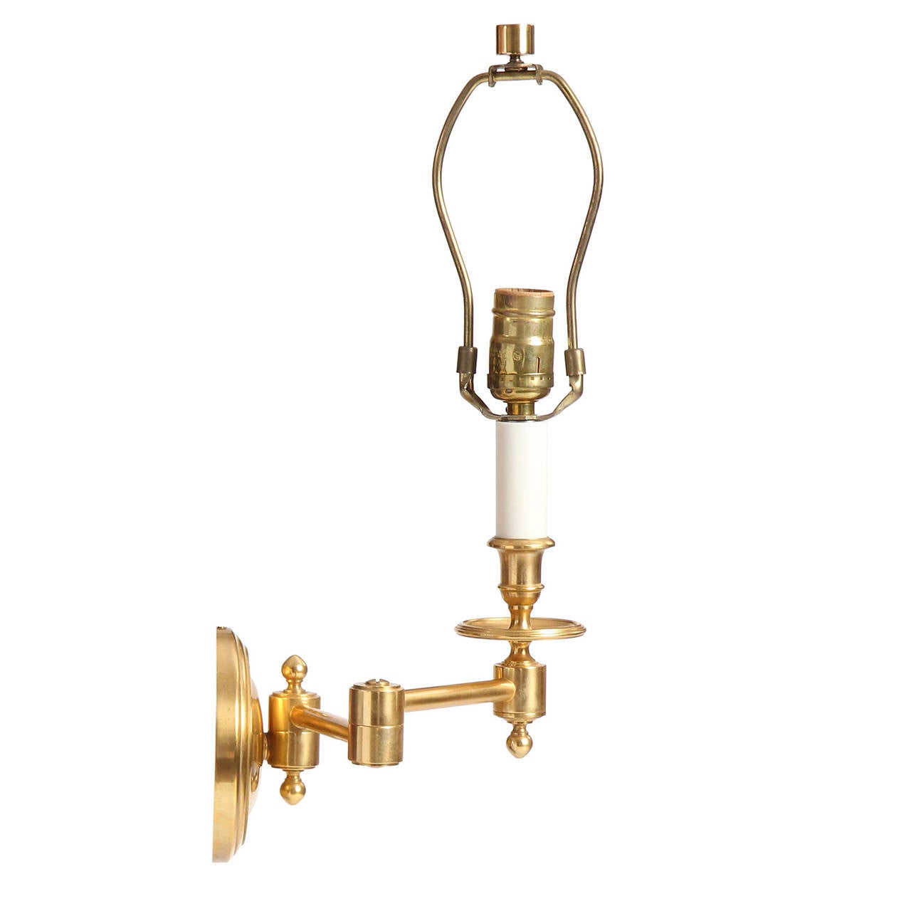 A Pair of Brass Swing Arm Wall Sconces 1
