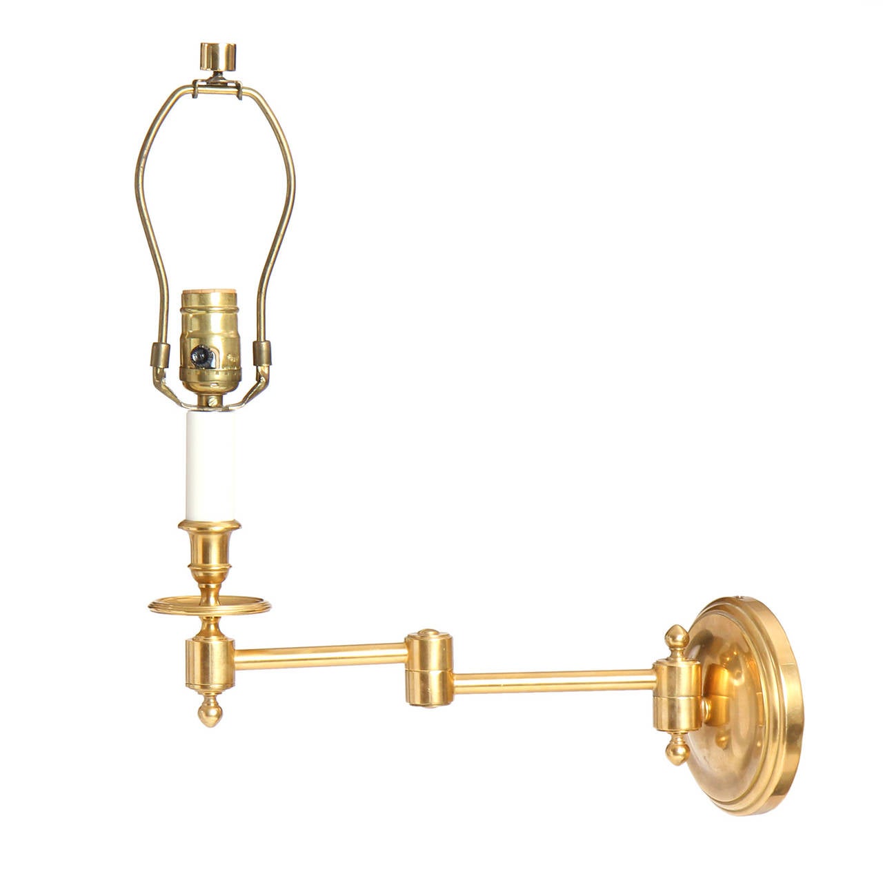 American A Pair of Brass Swing Arm Wall Sconces