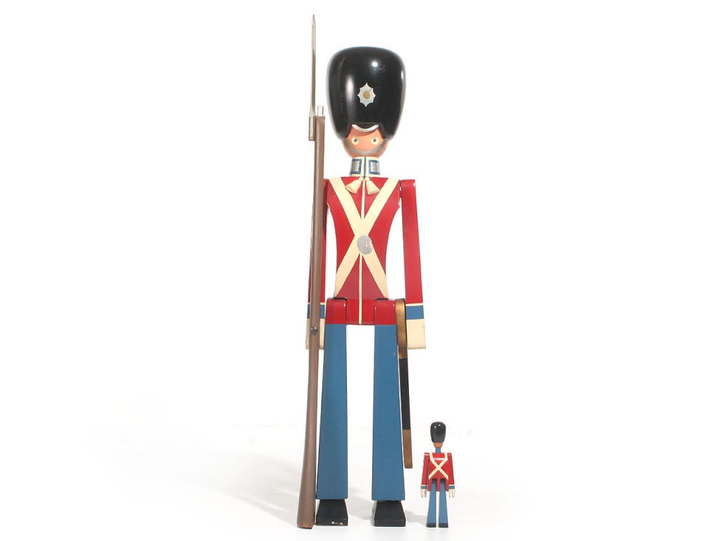 A very rare and monumental giant-sized model of the Royal Danish King's Guardsman hand crafted in wood having movable arms and legs and retaining its vivid original paint.