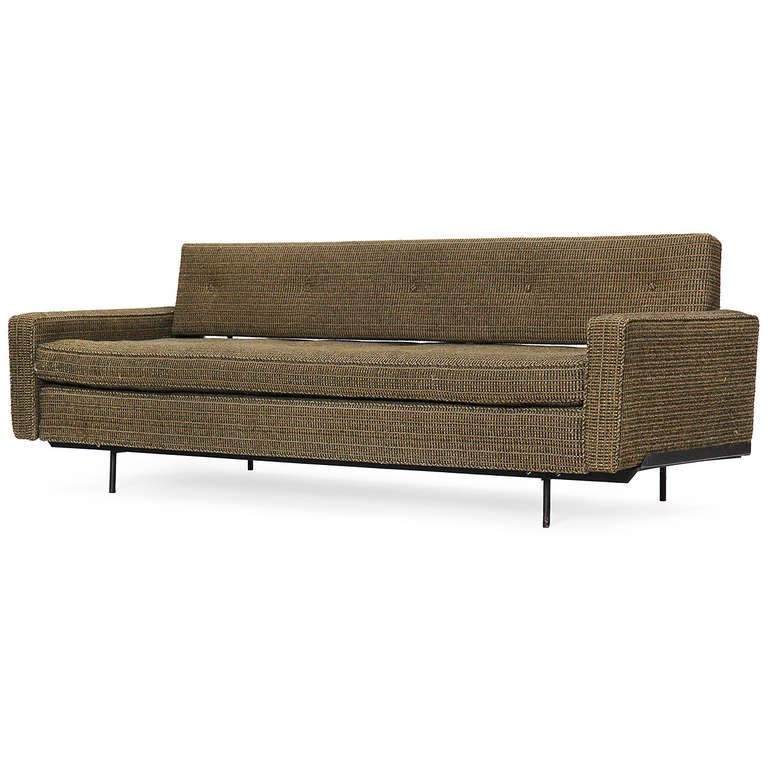 An adjustable and uncommon daybed/sofa having a thin-gauged iron base supporting a tailored and generously scaled sofa or daybed that retains its original Knoll tweed fabric.