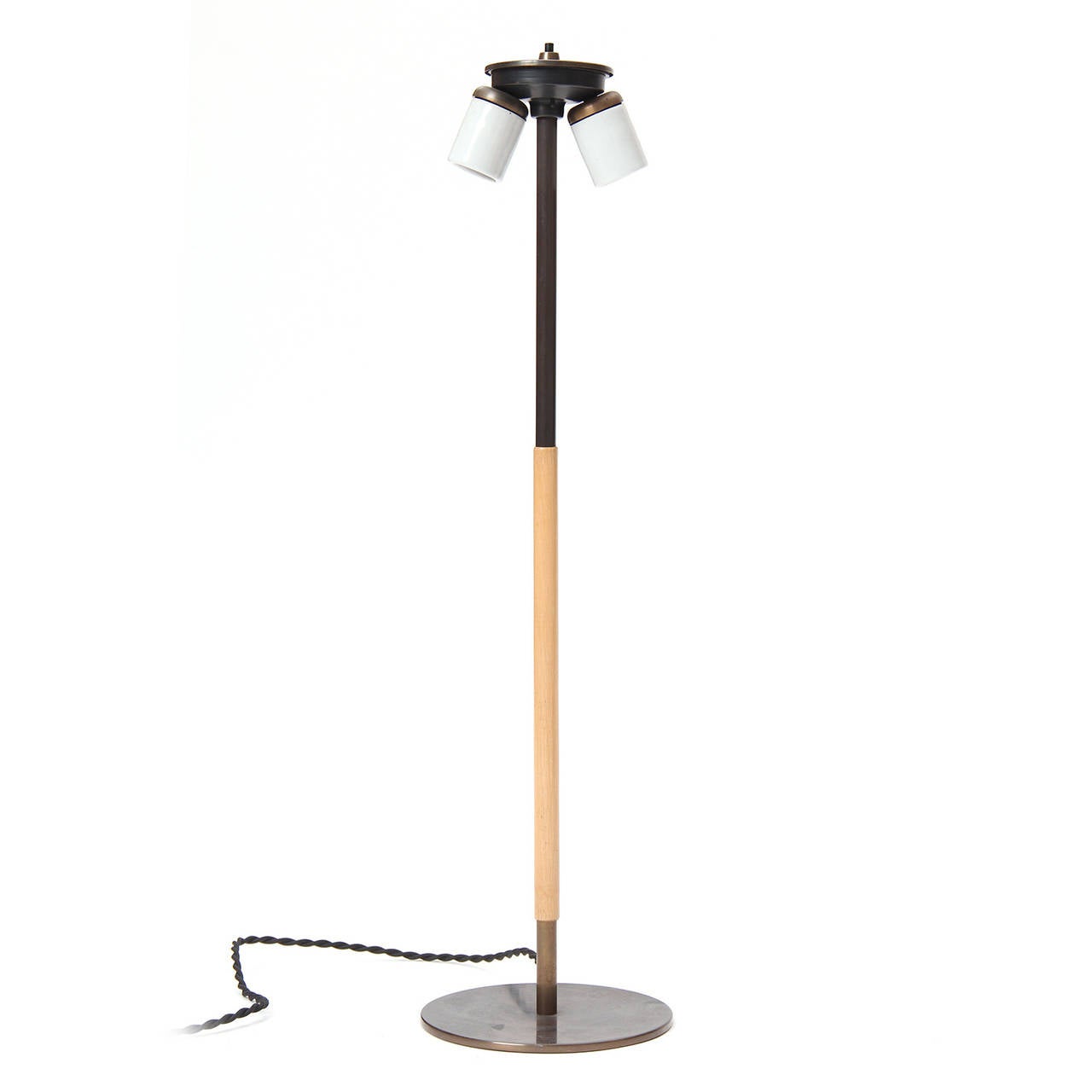 A spare and minimalist two-socket table lamp superbly crafted of patinated bronze and white oak.