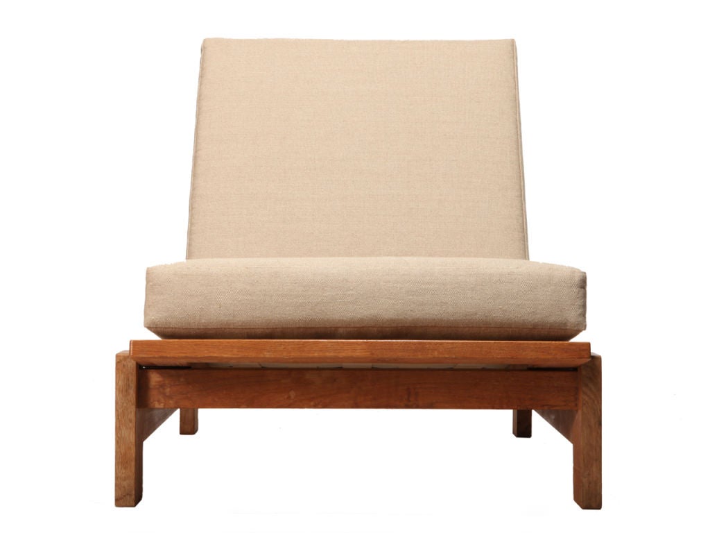 a solid oak framed lounge chair/daybed chaise with loose cushions. Designed by Hans Wegner for Getama