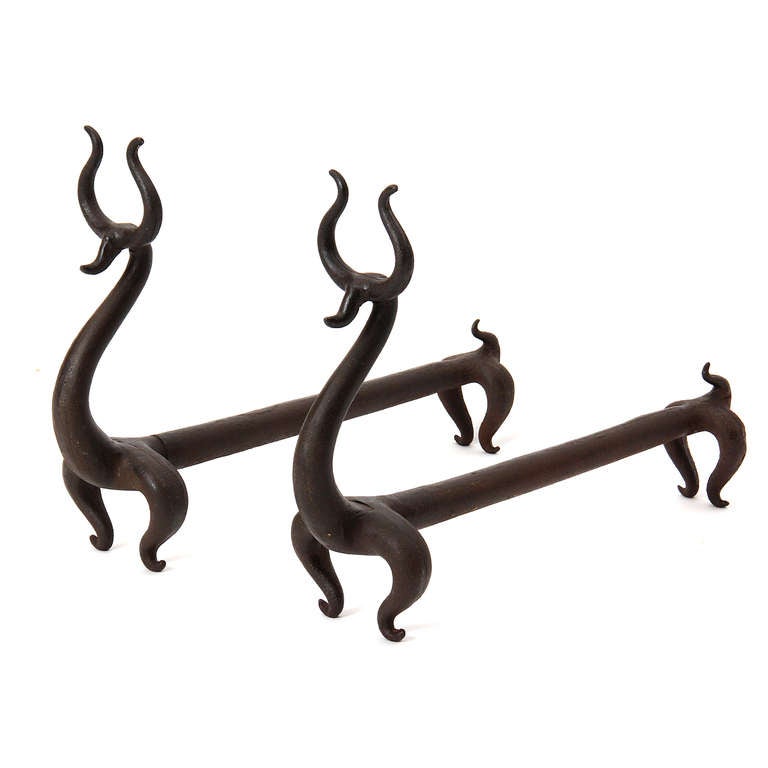 A set of rare wrought-iron deer andirons from Russel Wright's Circus Series.