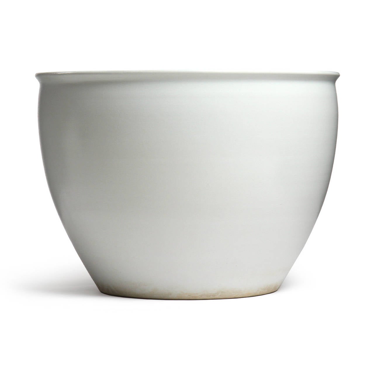 A pair of finely crafted and generously scaled circular ceramic jardinières covered in a rich cream matte salt glaze.