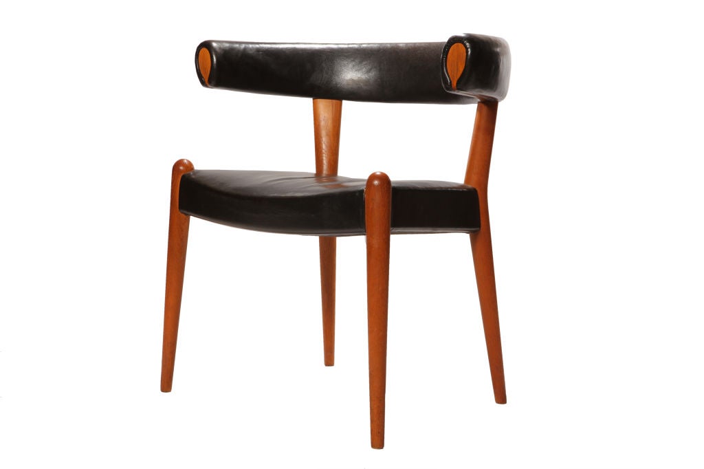 An exquisite and original condition rare oxhide upholstered oak frame Bullhorn chair.

