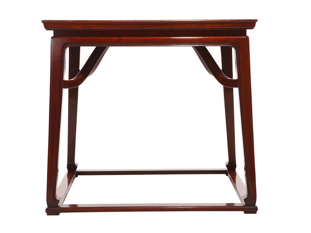 A pair of walnut end table of Chinese influence.