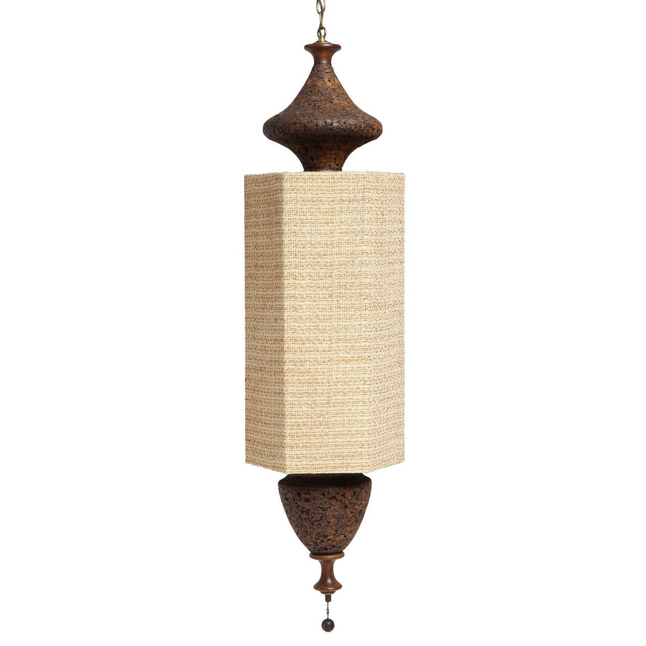 A well scaled and unusual hanging pendant lamp having sculptural cork ends capped with turned wood finials and a central fabric wrapped hexagonal shade.