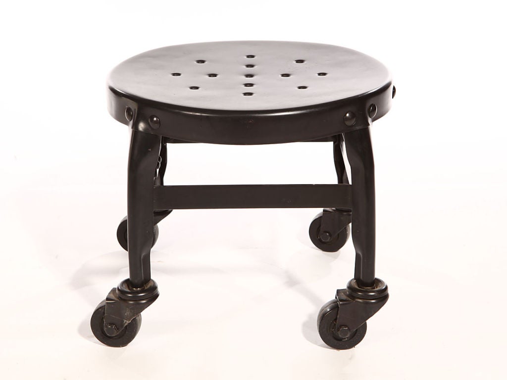 Low industrial steel stool on Casters
