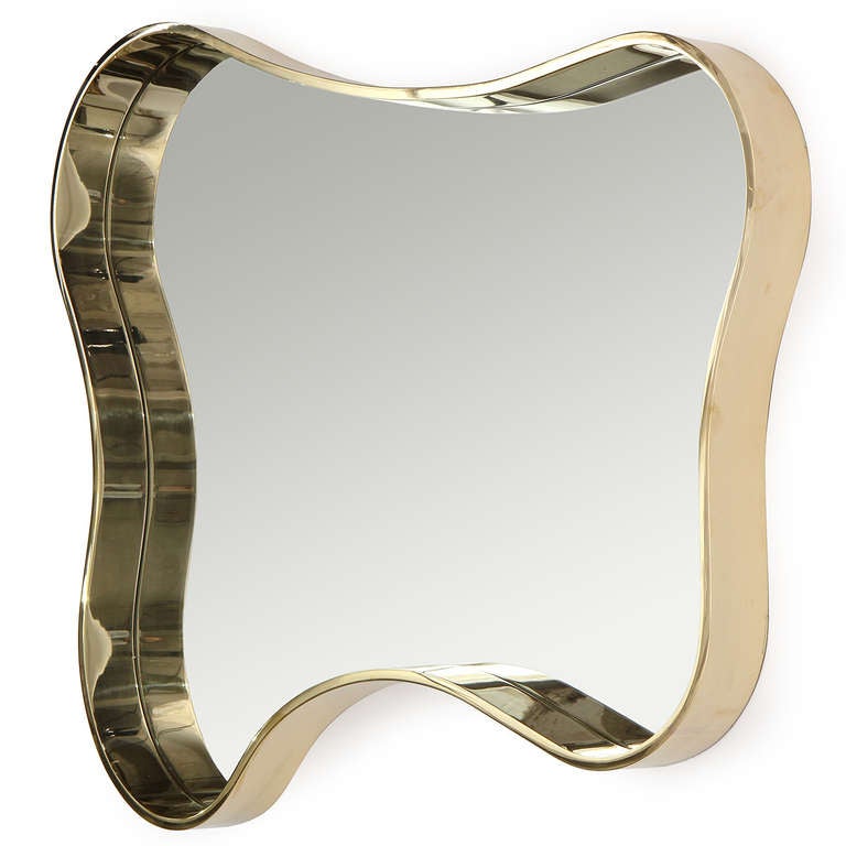 An excellent freeform mirror in polished brass with the ability to hang multiple directions.