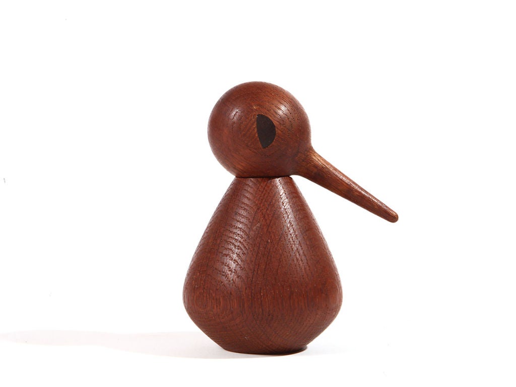 A small oak bird figure comprised of two separate pieces to position.