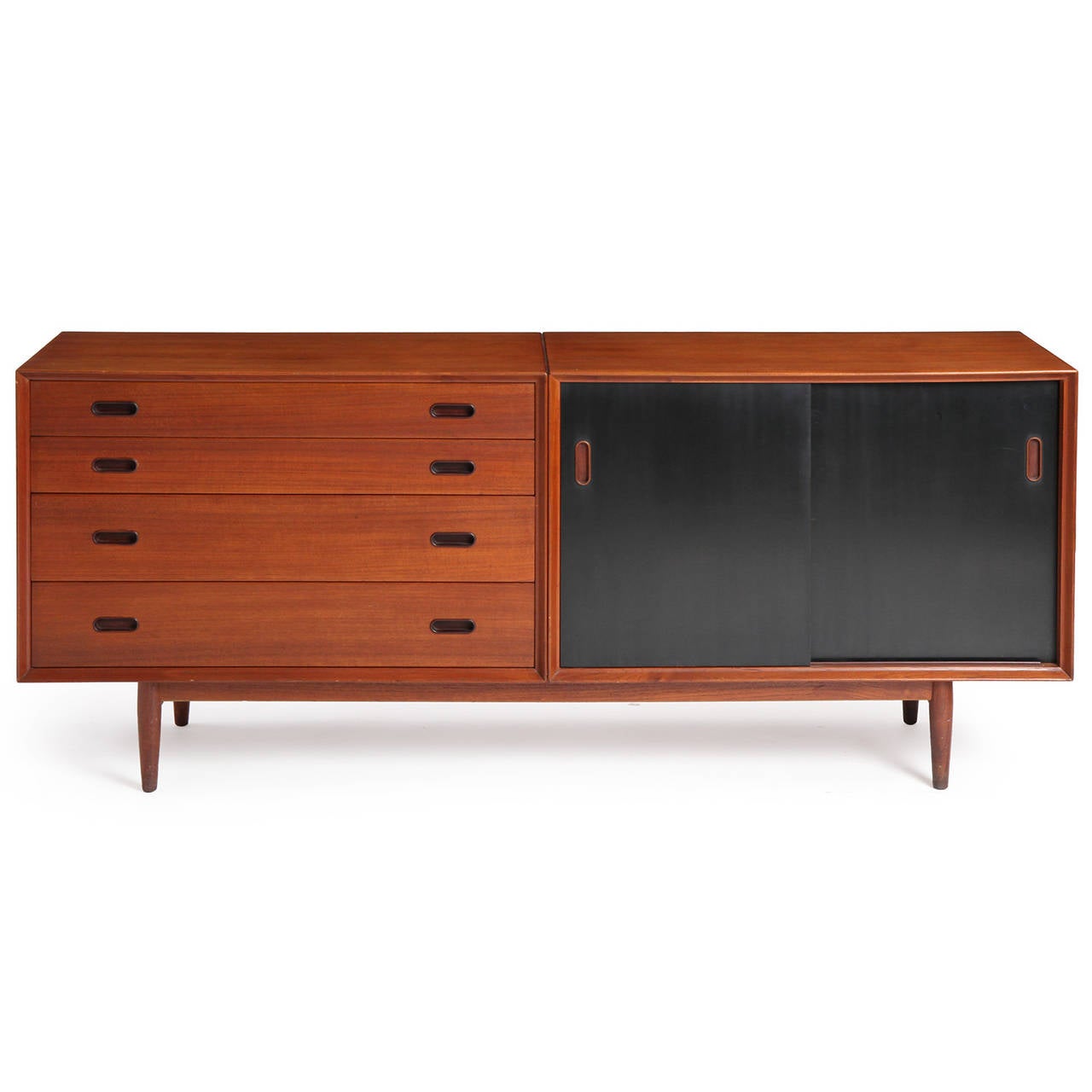 A refined and elegant credenza or sideboard having two distinct conjoined sections cantilevered over an architectural base: a cabinet with two reversible lacquered sliding doors (the other side being natural teak); the other section having a bank of
