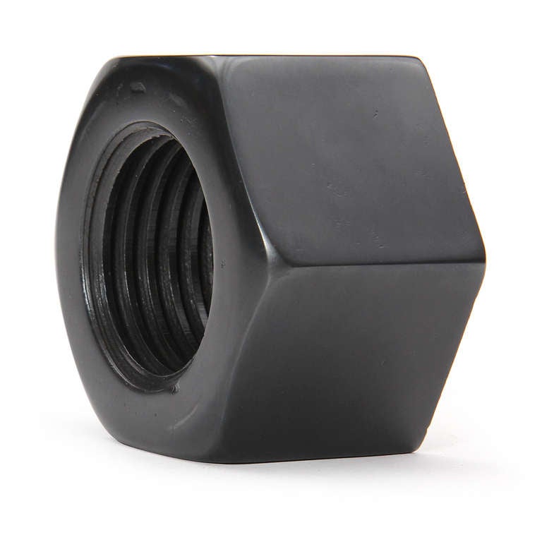 A functional and/or decorative over scaled industrial threaded patinated steel nut from the Pop Art era.