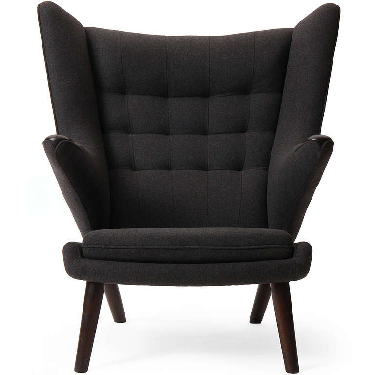 The best lounge chair ever? A pair of stately and sculptural Papa Bear wing chairs having cantilevered arms, tapered teak dowel legs; newly and beautifully upholstered in a soft and rich charcoal grey wool flannel.

ONLY 1 AVAILABLE