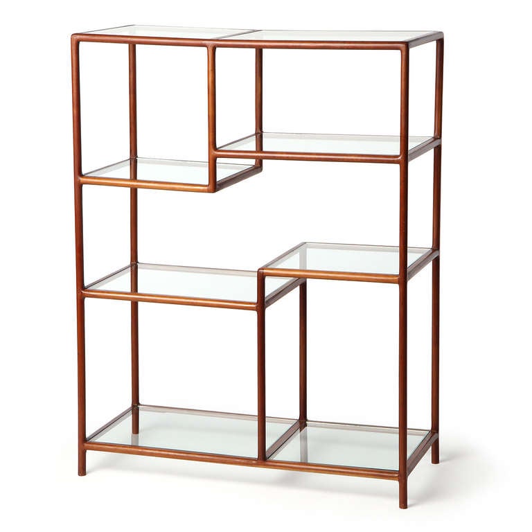 A superb etagere of dowel-like solid birch frame with excellent joinery supporting glass shelves.