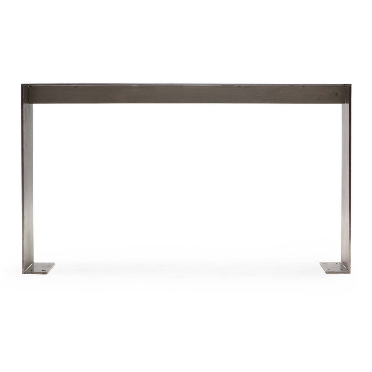 A masterfully fabricated and generously scaled rectilinear polished steel console table from New York's Yankee Stadium having inlaid Yankees logos on the top.