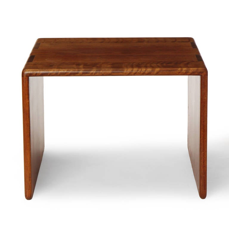 A superb pair of large end tables crafted of beautifully figured solid walnut with exposed joinery.