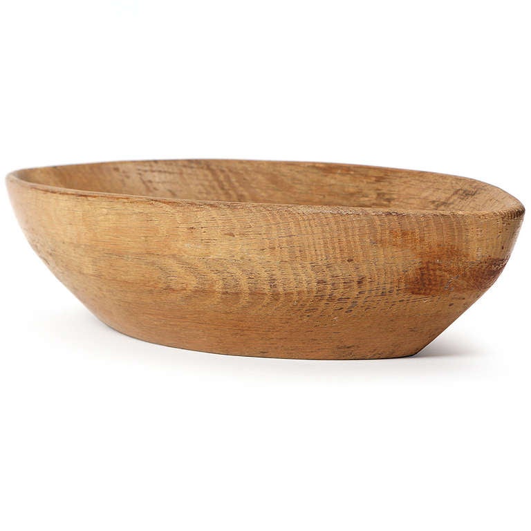 A rare oval bowl carved from stacked laminated bleached oak by Mary Wright. Signed and produced in very small quantities by Klise Wood Works.