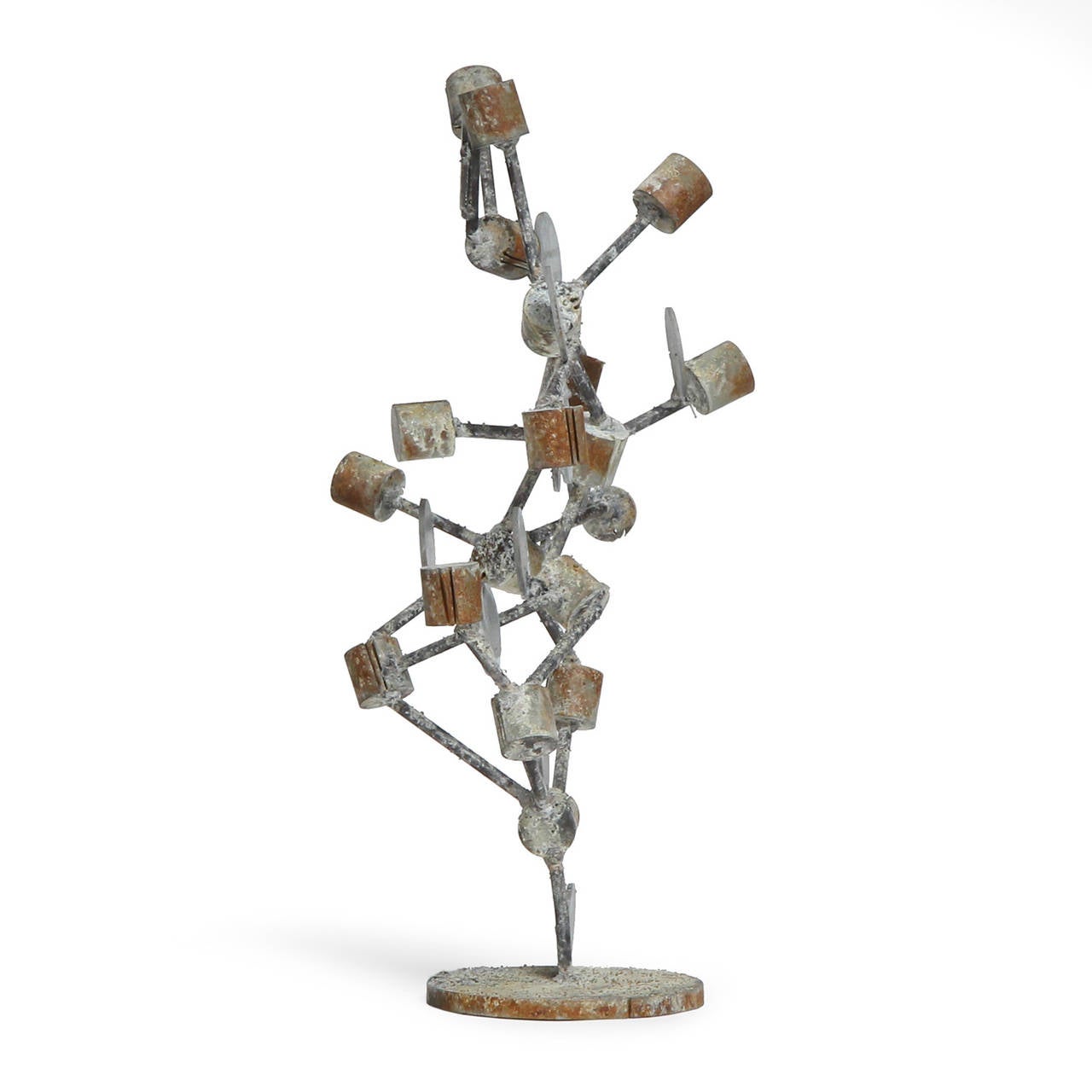 A unique and expressive tabletop sculpture evoking a molecular structure and crated of welded galvanized steel components rising from a disc base.