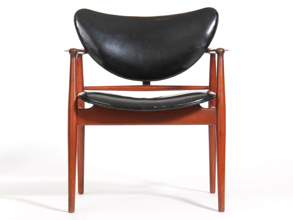 A rare teak side chair with a 