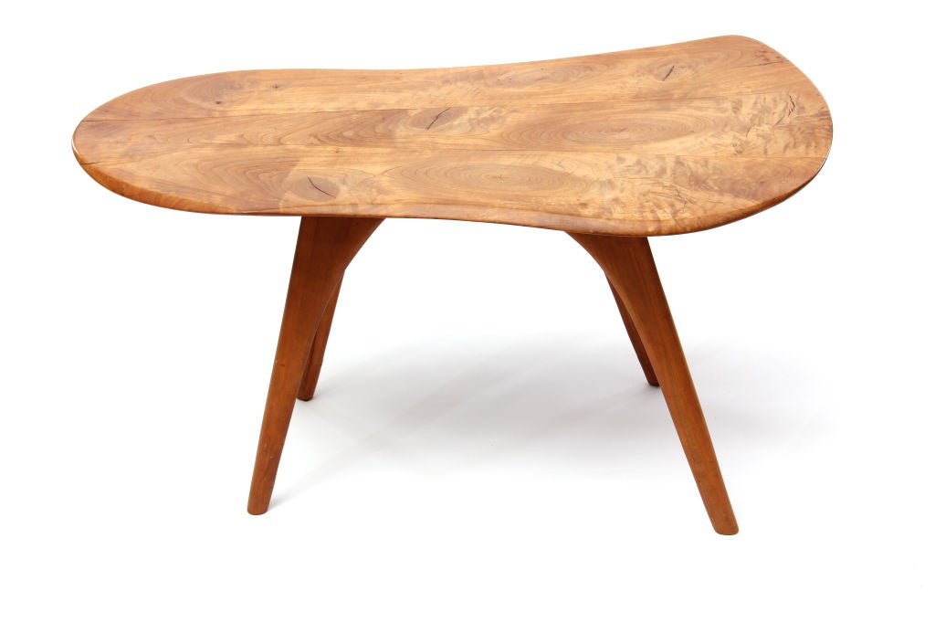 A unique and rare solid elm slab low table with splayed legs. Signed and dated W.E.