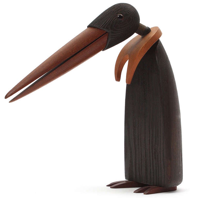 An expressive, tall and finely crafted long-beaked stork in figured fumed oak and teak with a fully adjustable head.