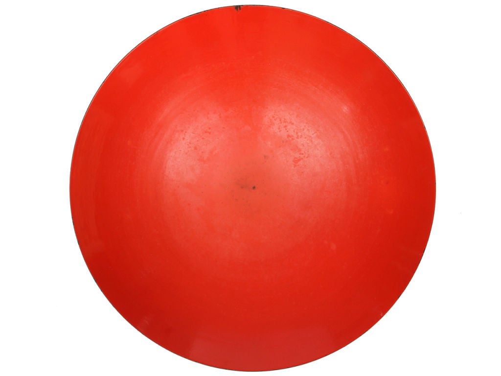 A spun steel bowl coated in red lacquer. Three sizes available: Large (30.5