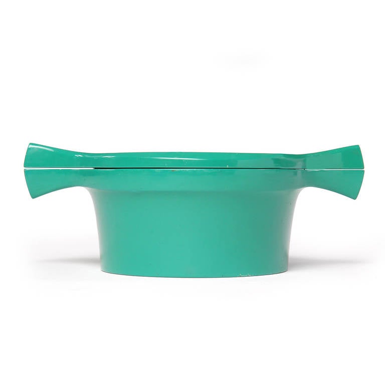 An uncommon, sculptural and finely crafted lidded ice bucket covered in a vibrant green lacquer.