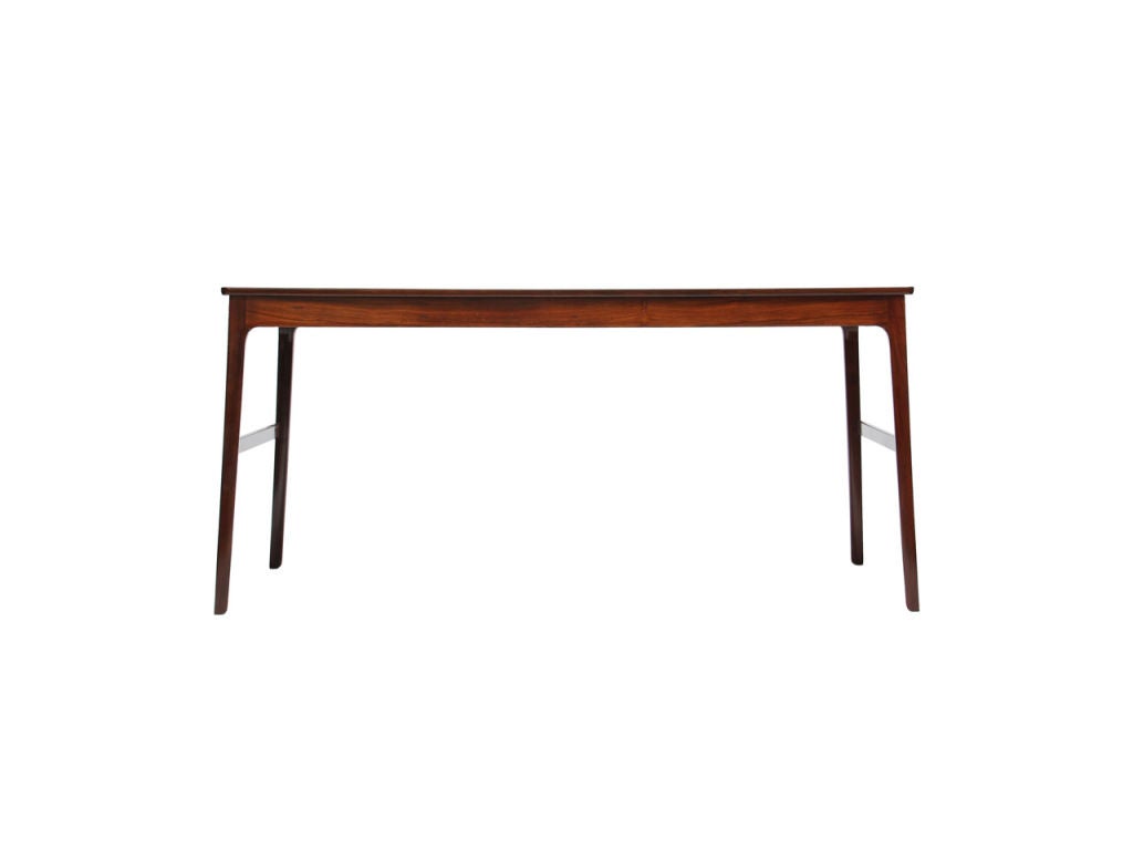 A rosewood desk with two lateral pullouts, on tapered legs. (19