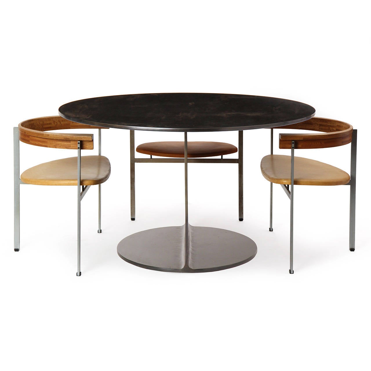 An I-Beam 'Gong' table of great weight and stability, crafted of cut, welded and blackened steel. The Gong tabel is made to order and takes 4-8 weeks to produce. Available in steel, stainless steel and bronze in brushed, satin, polished or blackened