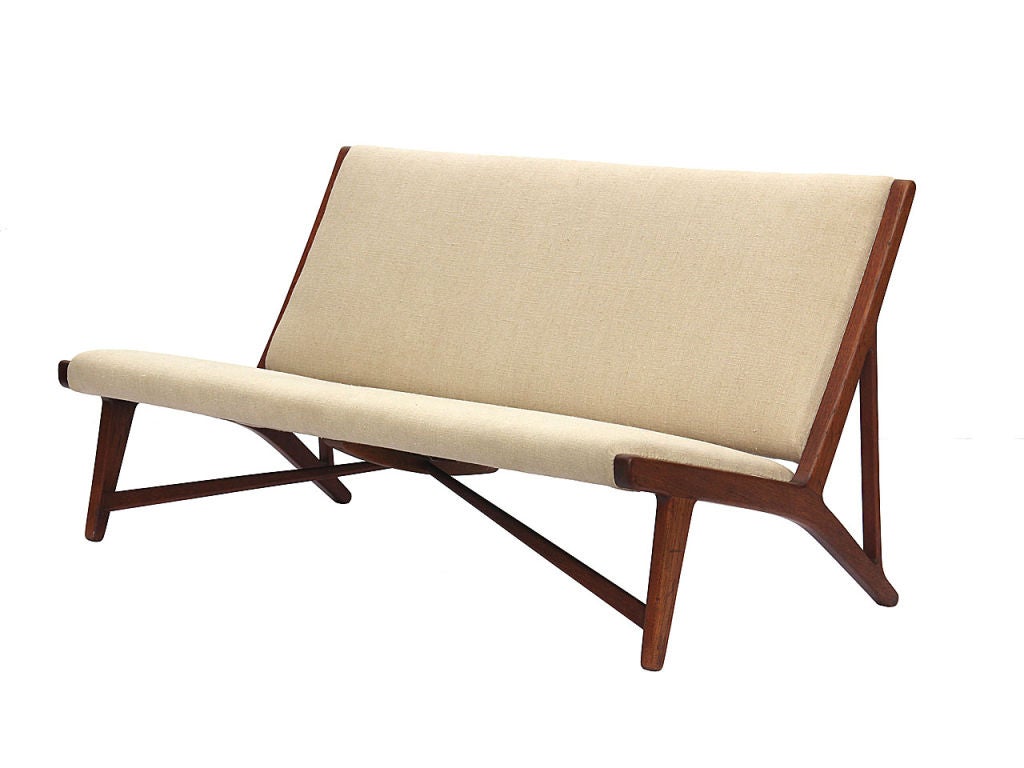 Danish teak and linen settee by Hans Wegner