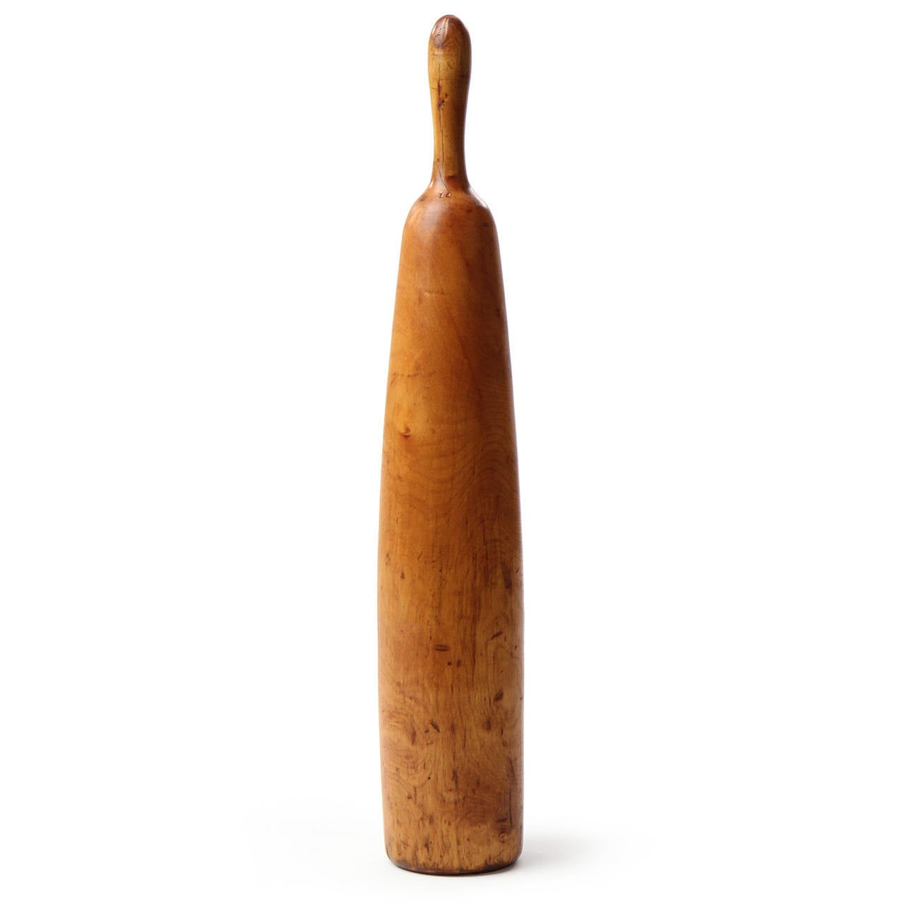 A well scaled and beautifully patinated hand-turned Indian exercise club crafted of honey-toned maple.