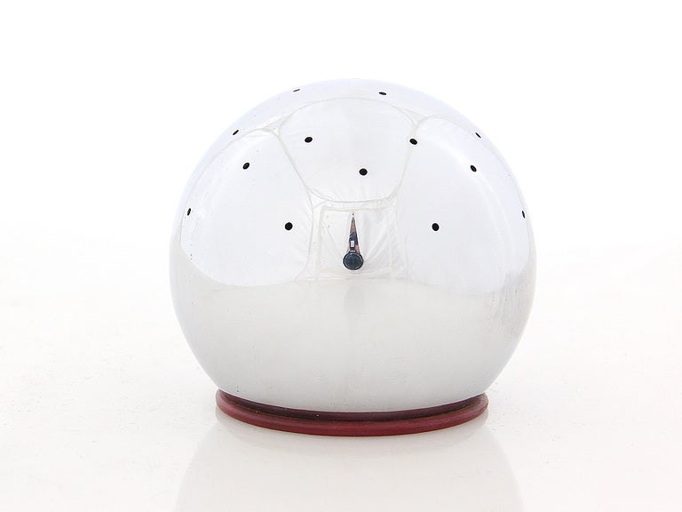 A polished silver sphere with multiple perforations for holding and dispensing toothpicks. Stamped 
