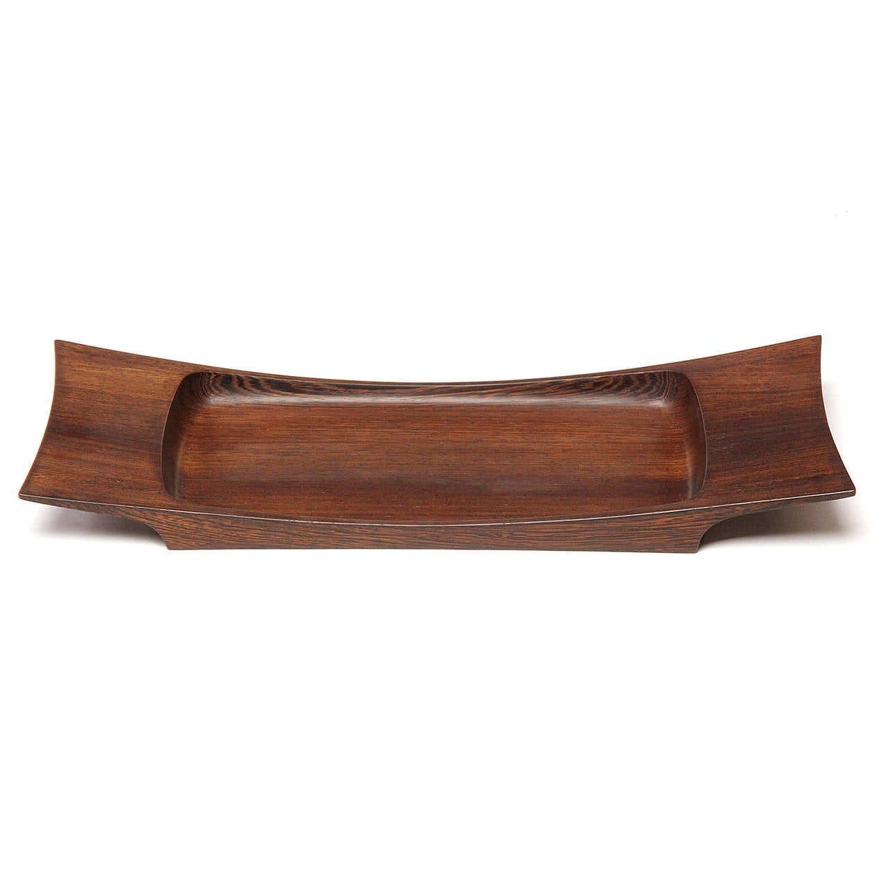 A superb and substantial tray masterfully carved of vividly grained African Wenge.