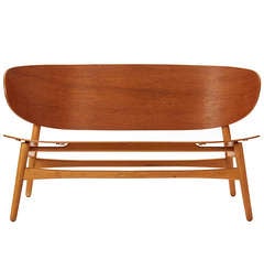 shell settee by Hans Wegner