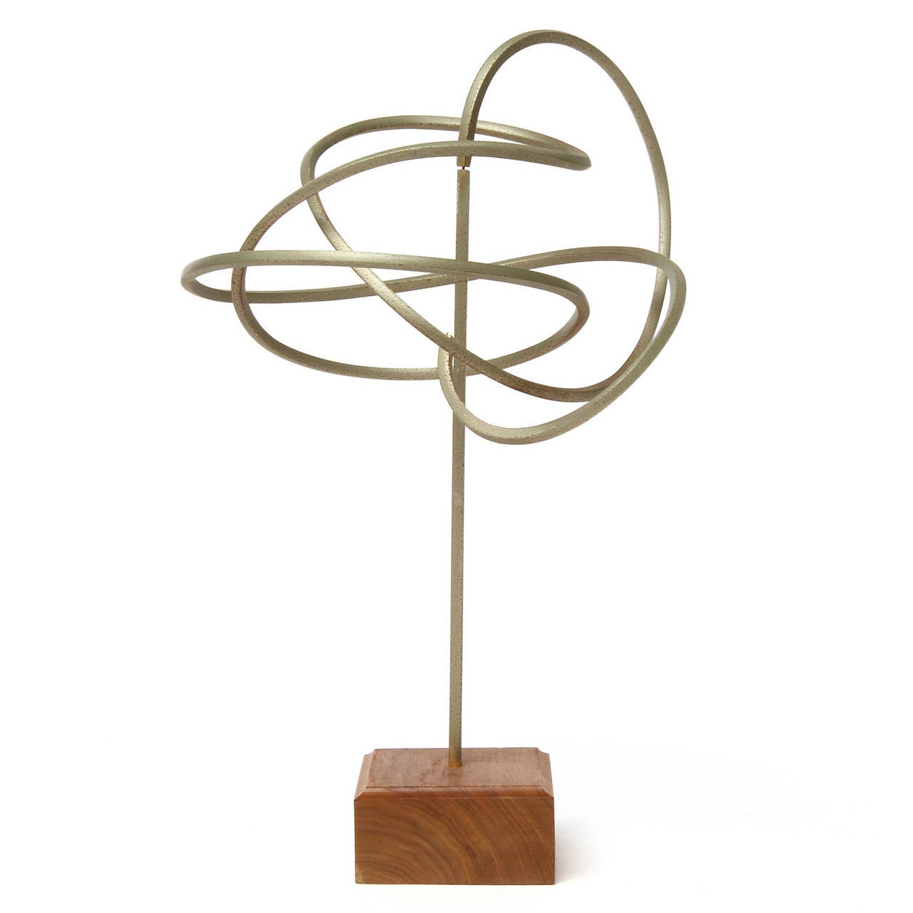 A dramatic and beautifully constructed Kinetic sculpture having a looping and spiraling steel element delicately perched atop a vertical rod mounted onto a square walnut base.