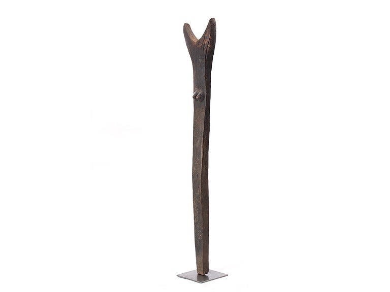 An solid ironwood Dogon house post with crotch spit top and two breasts. Mali 20th century.