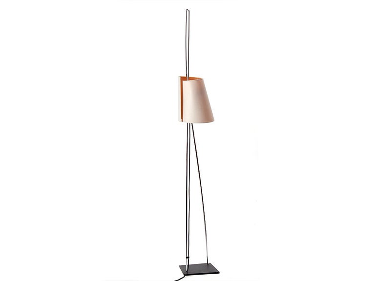 A Mid-Century Modern floor lamp created by Italiana Luce featuring a continuous chrome rod set asymmetrically with an adjustable position shade that wraps around the stem. Made in Italy, circa 1960s.